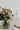 A wedding table centre in soft blush tones from award winning wedding florist The Flower Lounge in Manchester.