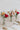 small wedding table decorations with three bud vases in vibrant colours full of bold bright colours from Manchester wedding florist The Flower Lounge.