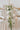 classic white and green bud vases for simple wedding tables. Best small table centres from wedding florist The Flower Lounge manchester